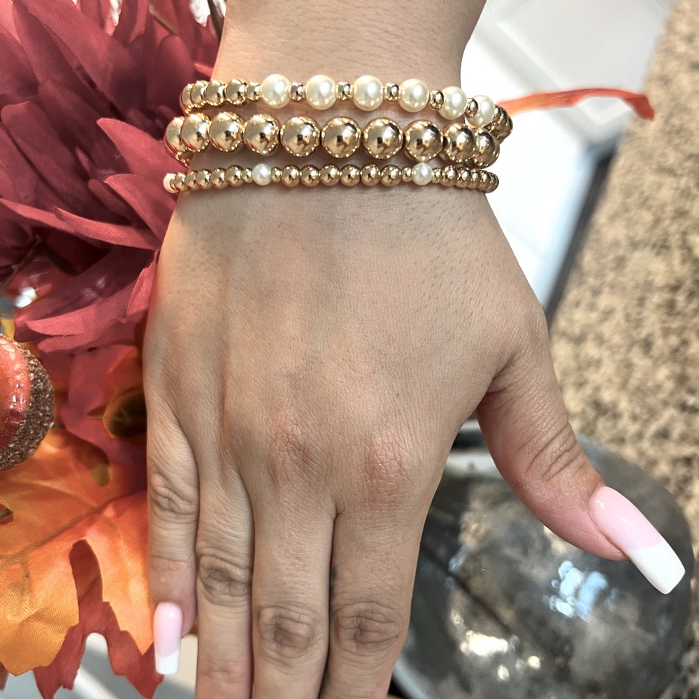 Golf filled handmade stackable bracelets.